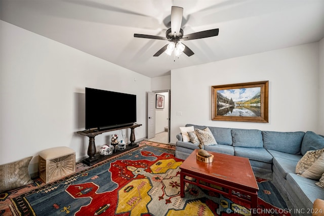 living room with vaulted ceiling and ceiling fan