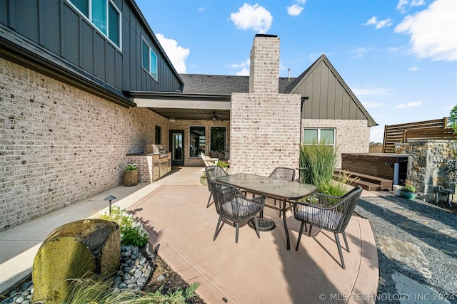 view of patio / terrace featuring ceiling fan