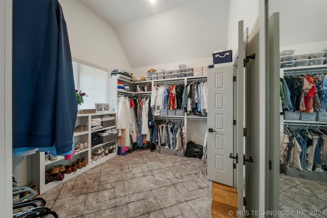 spacious closet with lofted ceiling