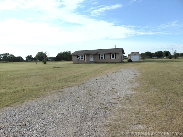 ranch-style home with a front yard