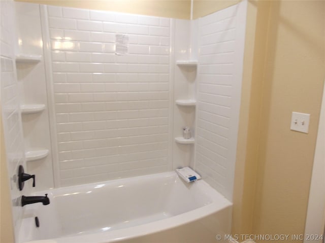 bathroom with shower / bathing tub combination