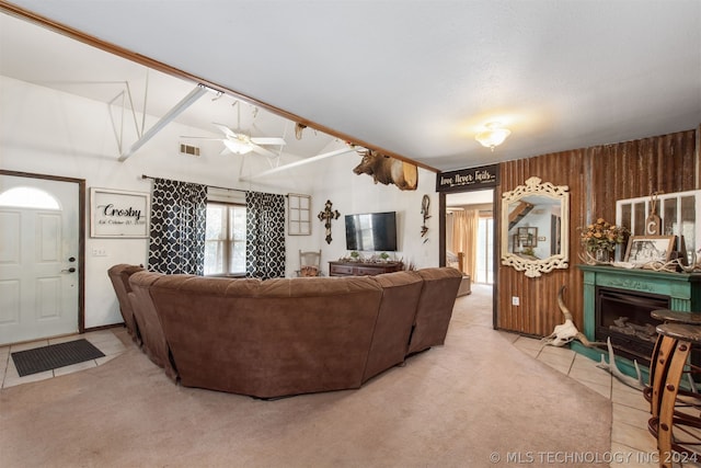 living room with carpet flooring and ceiling fan