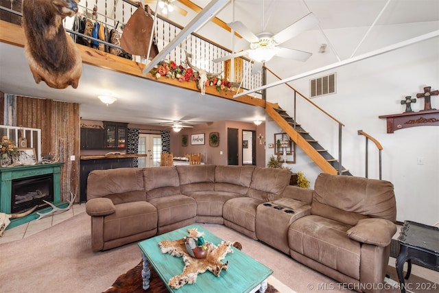 living room with carpet floors and ceiling fan