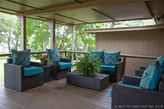 deck featuring an outdoor living space