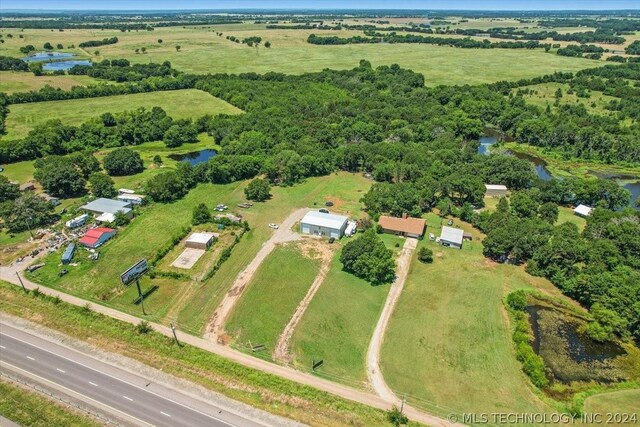 bird's eye view with a rural view and a water view