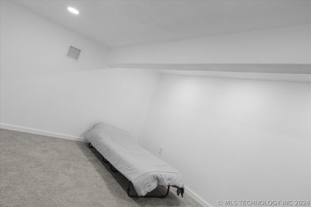 interior space featuring carpet, visible vents, baseboards, and recessed lighting