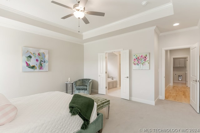 carpeted bedroom with crown molding, ensuite bathroom, and ceiling fan