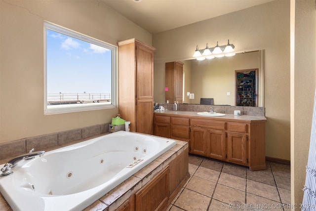 bathroom with vanity, tile patterned floors, and a bathing tub