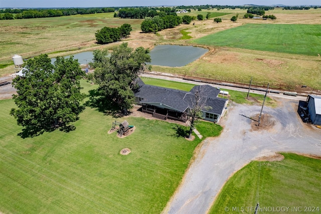 drone / aerial view featuring a water view and a rural view