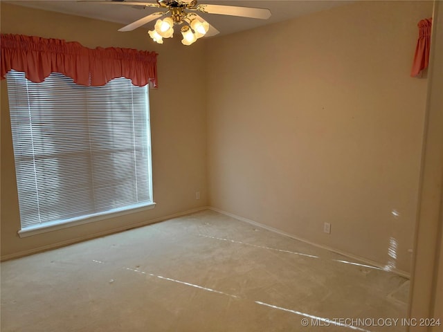 unfurnished room featuring ceiling fan