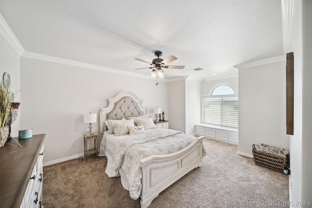 bedroom with carpet floors, ceiling fan, and crown molding