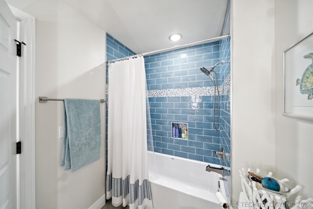 bathroom featuring shower / tub combo with curtain