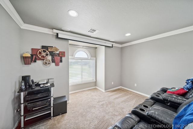 home theater with ornamental molding and carpet flooring