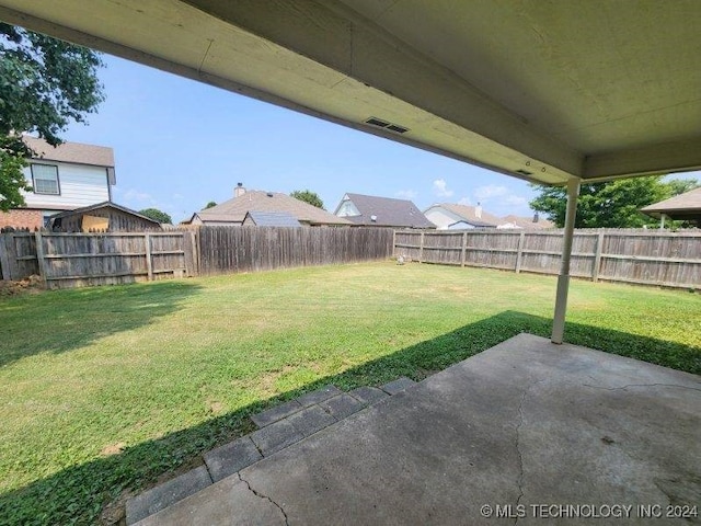 view of yard with a patio area