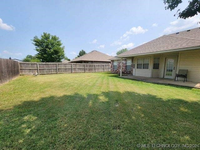 view of yard with a patio area