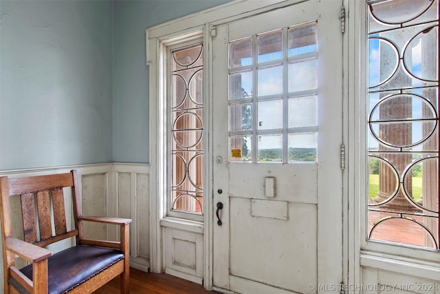 doorway to outside featuring hardwood / wood-style flooring