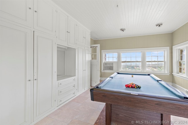 playroom featuring wood walls and pool table