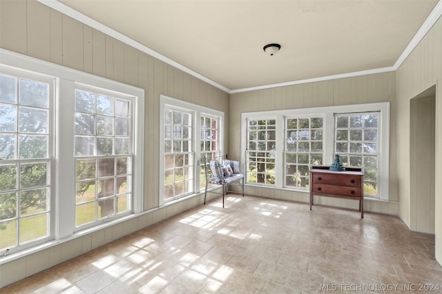 unfurnished sunroom with plenty of natural light