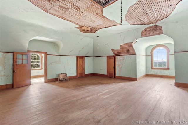 additional living space with light wood-type flooring