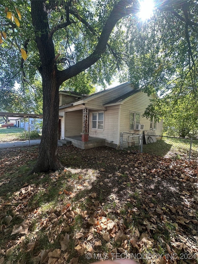 303 S B, Davis, OK 73030 - view of side of home with an attached garage