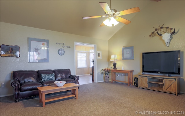 carpeted living room featuring ceiling fan and high vaulted ceiling