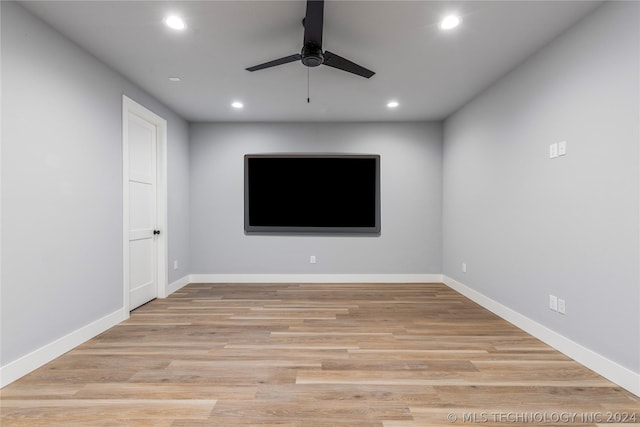 spare room with ceiling fan and light hardwood / wood-style floors