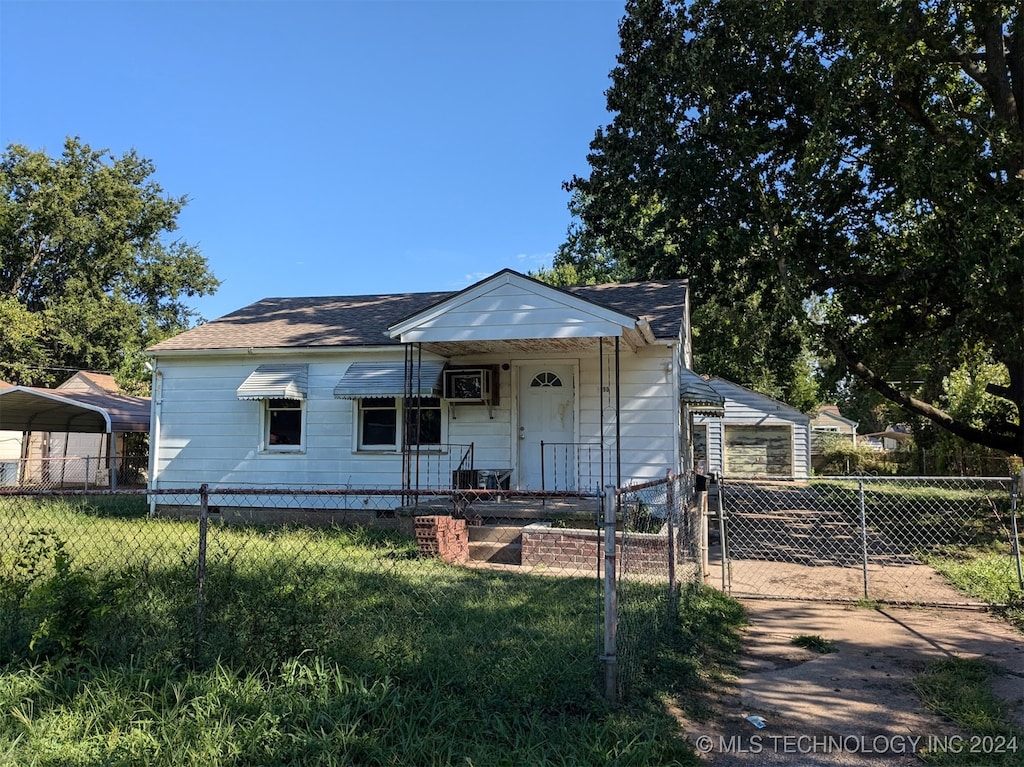 view of front of home with a front yard