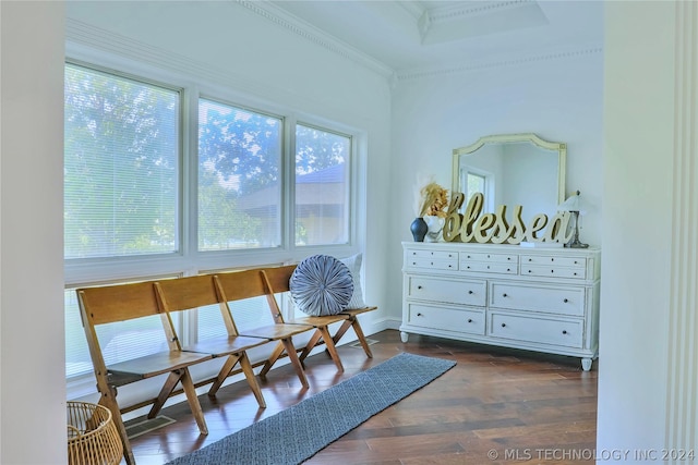 sitting room featuring crown molding and dark hardwood / wood-style floors