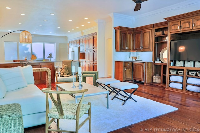 living room featuring crown molding and dark wood-type flooring