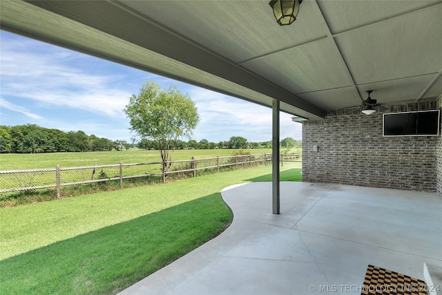 view of patio featuring ceiling fan