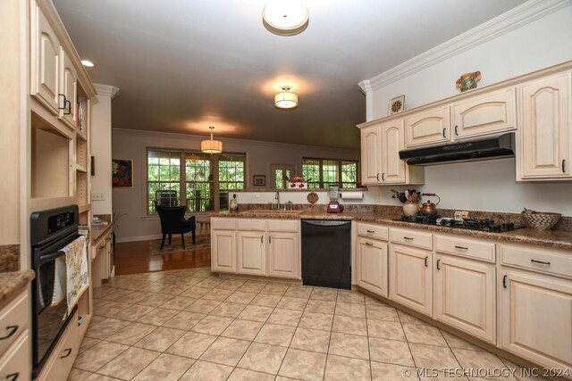 kitchen featuring ornamental molding, kitchen peninsula, and black appliances