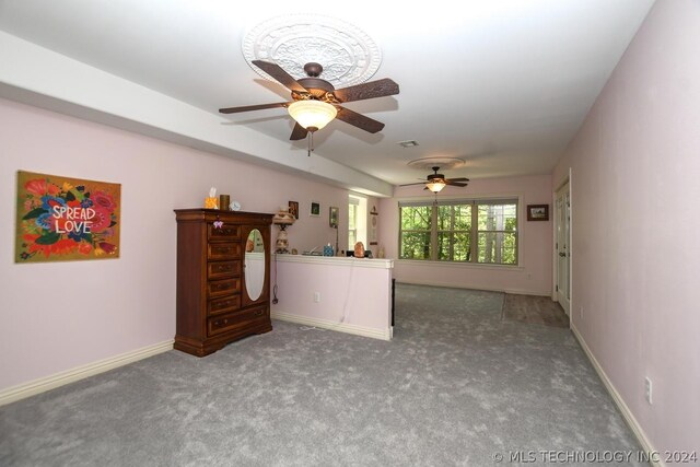 unfurnished living room with carpet floors