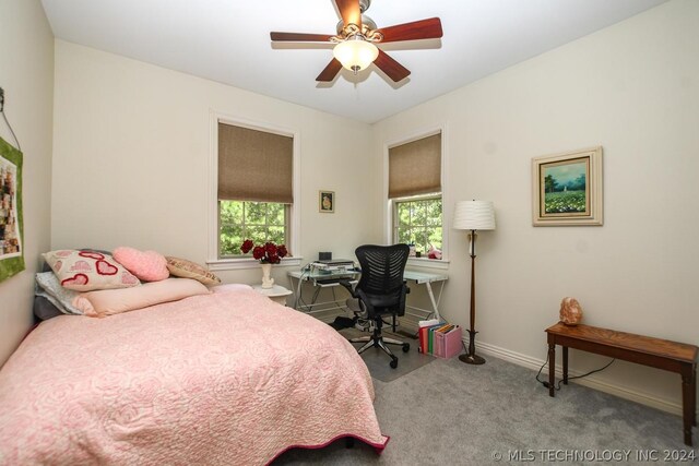 carpeted bedroom with ceiling fan