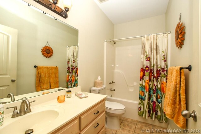 full bathroom featuring toilet, tile patterned floors, shower / bathtub combination with curtain, and vanity