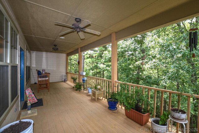 wooden deck with ceiling fan