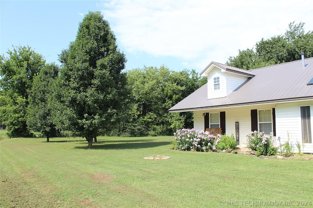 view of yard with covered porch