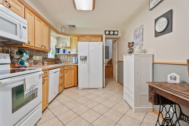 kitchen with decorative backsplash, light brown cabinetry, white appliances, and light tile patterned floors