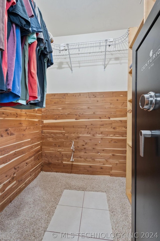 spacious closet with carpet floors