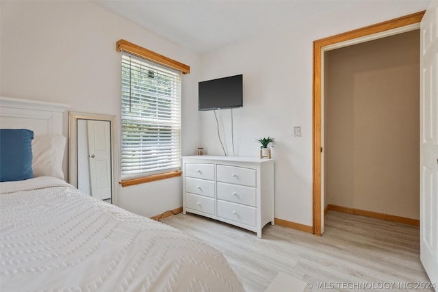 bedroom featuring light wood-type flooring