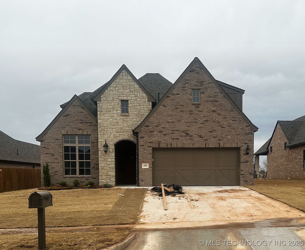 view of front of home with a garage