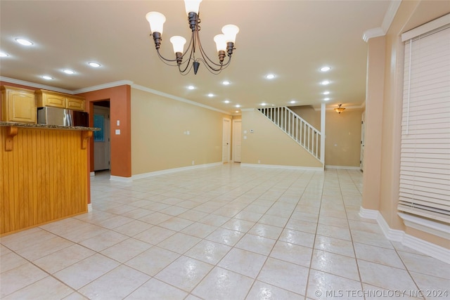 interior space with a notable chandelier and ornamental molding