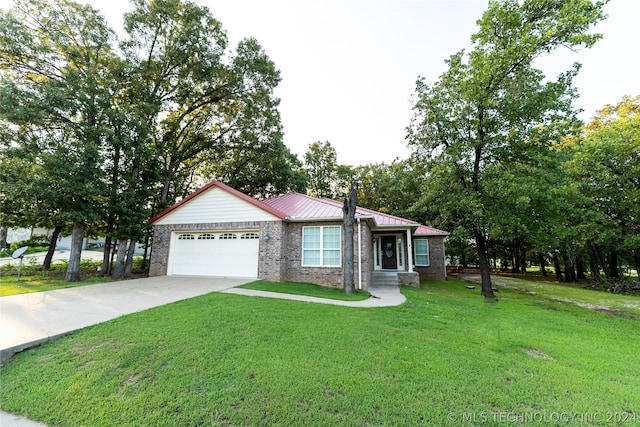 ranch-style home featuring a garage and a front lawn