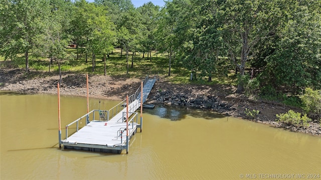 dock area featuring a water view