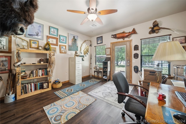 office with dark hardwood / wood-style flooring and ceiling fan