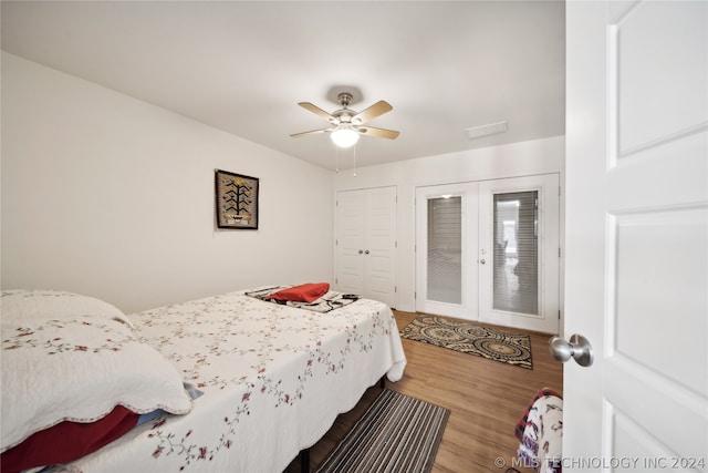 bedroom featuring ceiling fan, french doors, and light hardwood / wood-style flooring