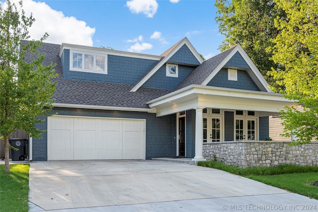 view of front of property featuring a garage