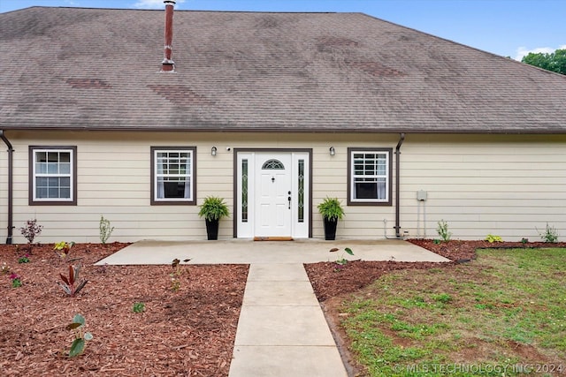 view of front facade with a patio