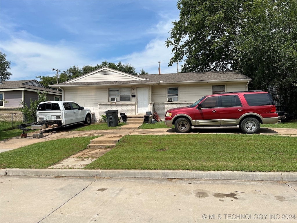 view of front of home with a front yard