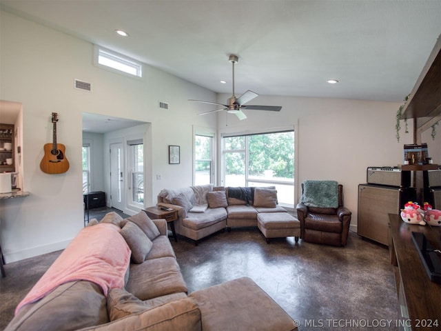 living area featuring finished concrete flooring, recessed lighting, visible vents, high vaulted ceiling, and baseboards