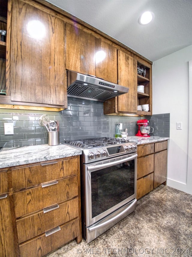 kitchen with range hood, brown cabinets, open shelves, tasteful backsplash, and gas stove